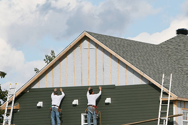 Professional Storm Damage Siding Repair technician working in Dunellen, NJ